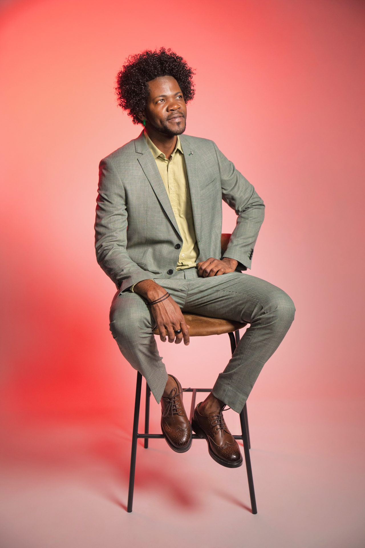 Studio portrait — tailored suit